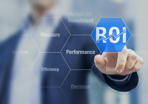 Businessman using ROI Return on Investment indicator
